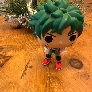 Funko Action Figure with Green Hair and Red Shoes